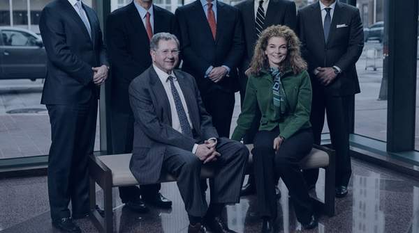 Editorial illustration for $3 Billion Hoge-Barrett Team Leaves Truist for Captrust, Extending a Run of Billion-Dollar Exits