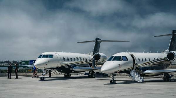 Editorial illustration for Navigating Corporate Jet Tax: An Executive Guide